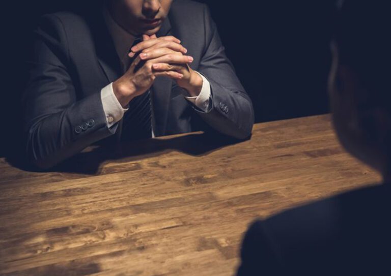 negotiation across the table in the dark